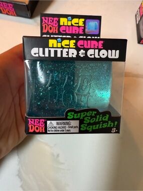 NeeDoh Nice Cube Glitter & Glow blue Squish Toy